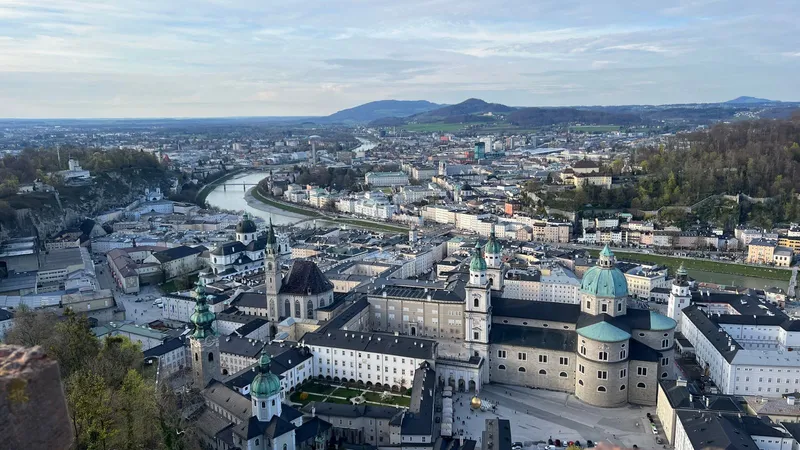 View from the Hohensalzburg fortress across the old town with the cathedral and the Kollegienkirche